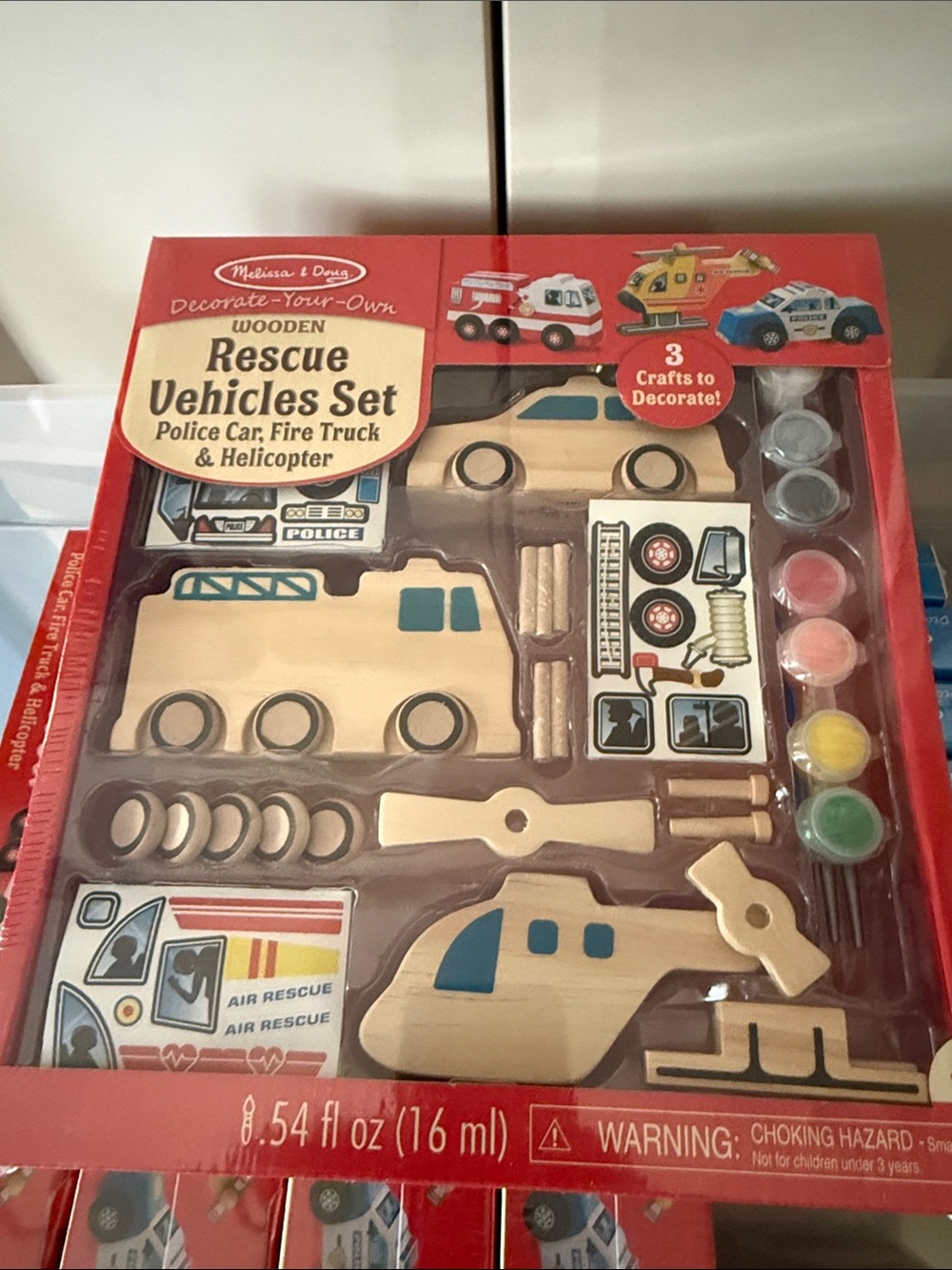 Melissa & Doug Wooden Rescue Vehicles Decorating Set - Red, Yellow, Blue, Green